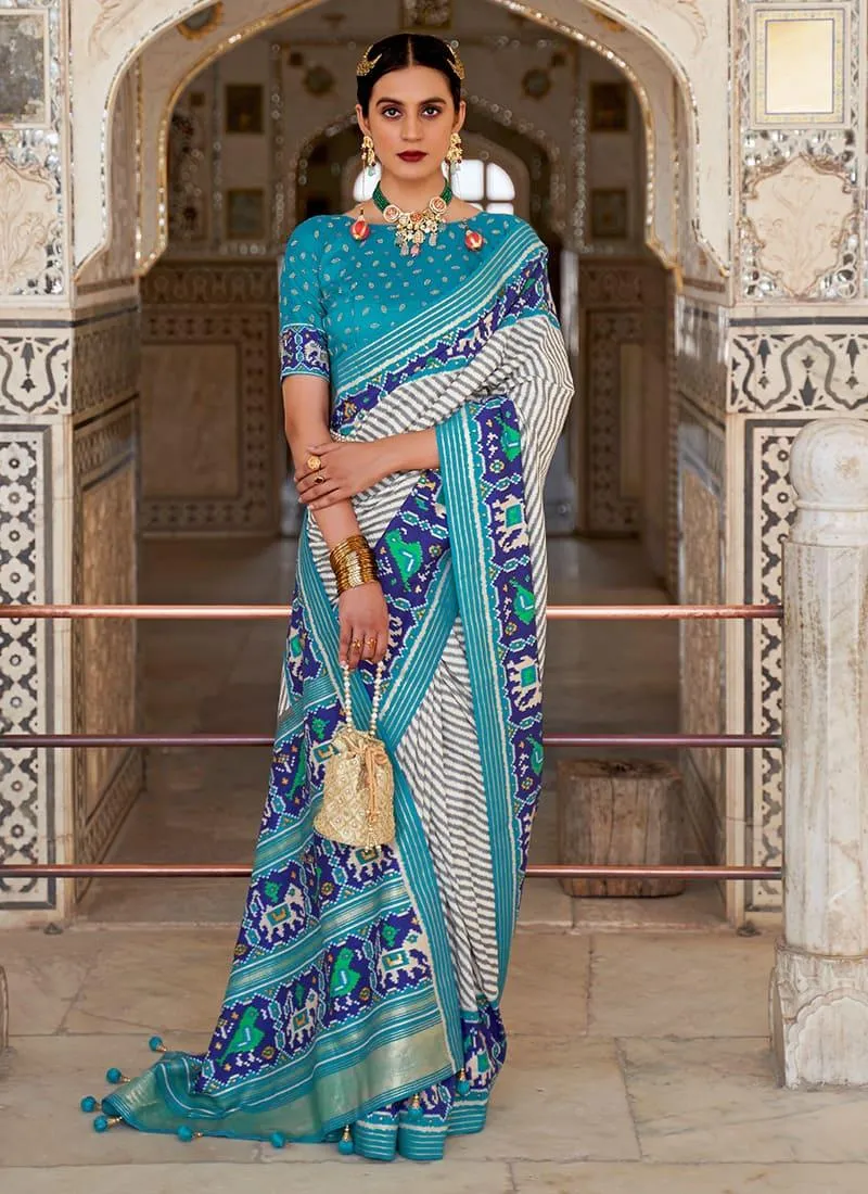 Aqua Green Color Patola Silk Saree With Matching Boat Neck Blouse