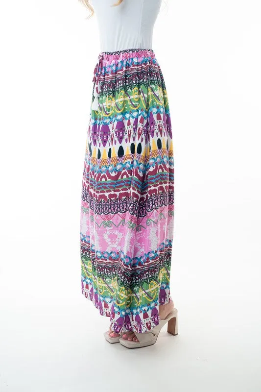 Bohemian Printed Elastic Waist Band Long Skirt with Tassels in Pink Combo by White Birch